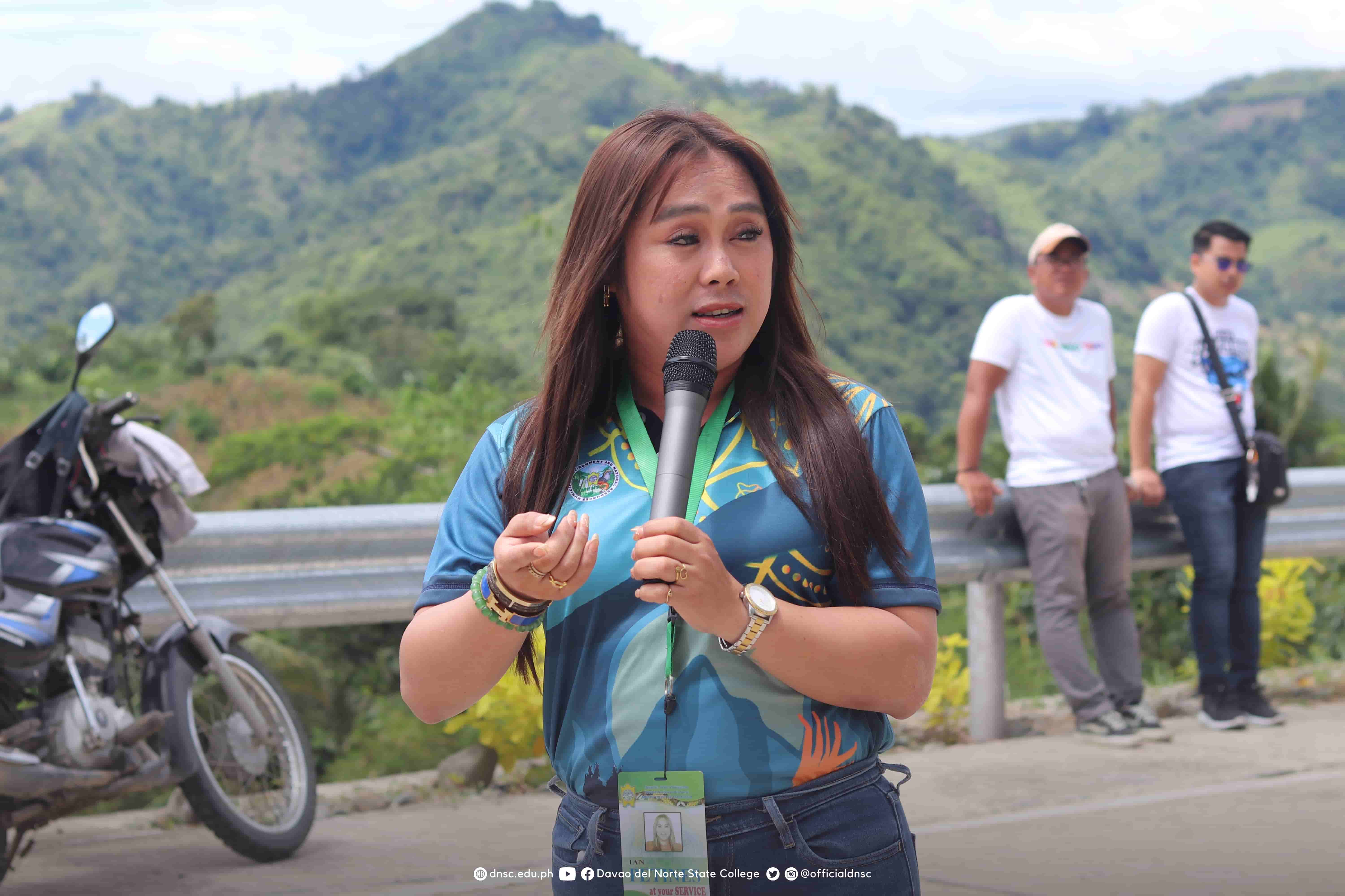 Ian Paul L. Petines, MENRO, addresses participants during the tree planting activity. Photo by Randy Magayon, DNSC PIO.